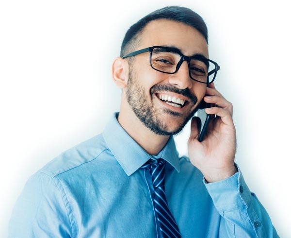 Happy Business Man Calling on Smartphone
